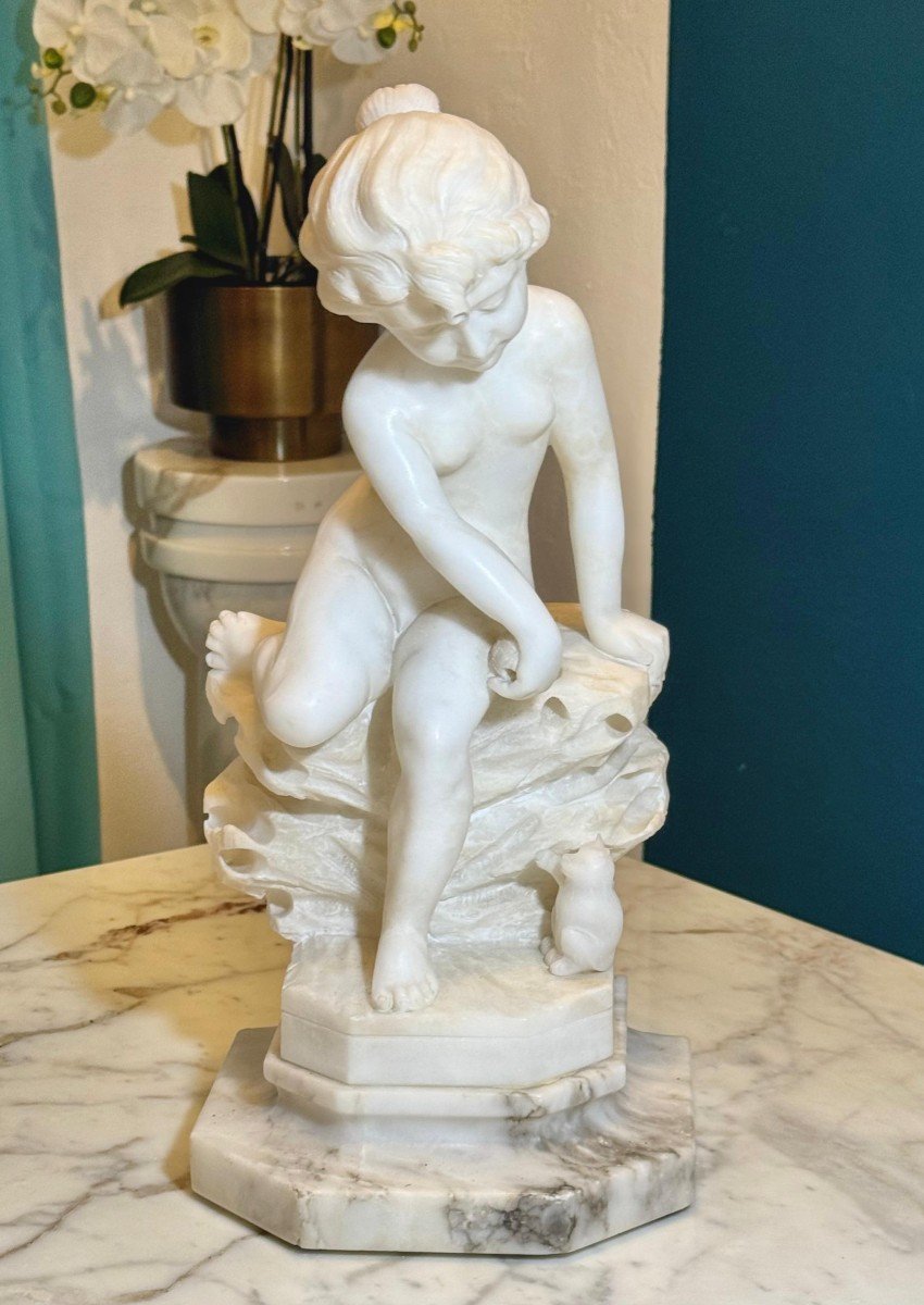 Statue Depicting A Little Boy Playing With A Kitten Marble