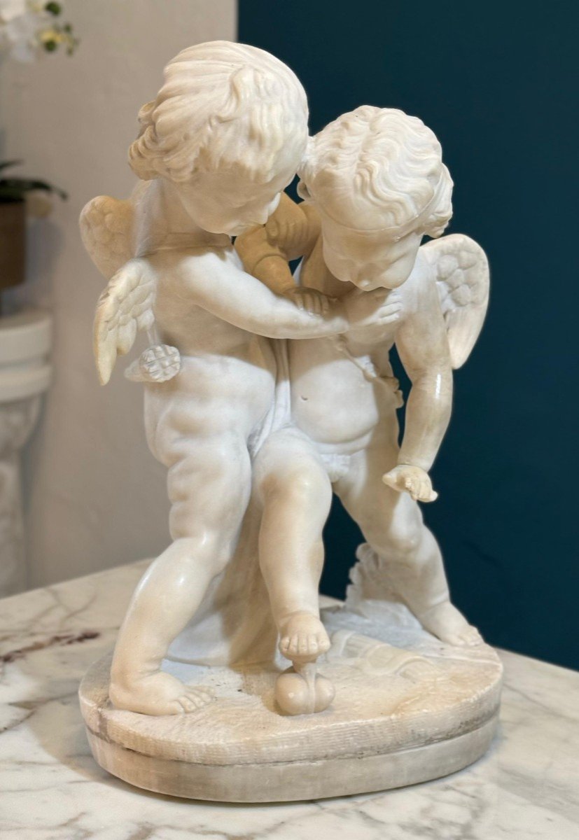 Sculpture Depicting Two Angels Fighting For The Heart Marble-photo-2