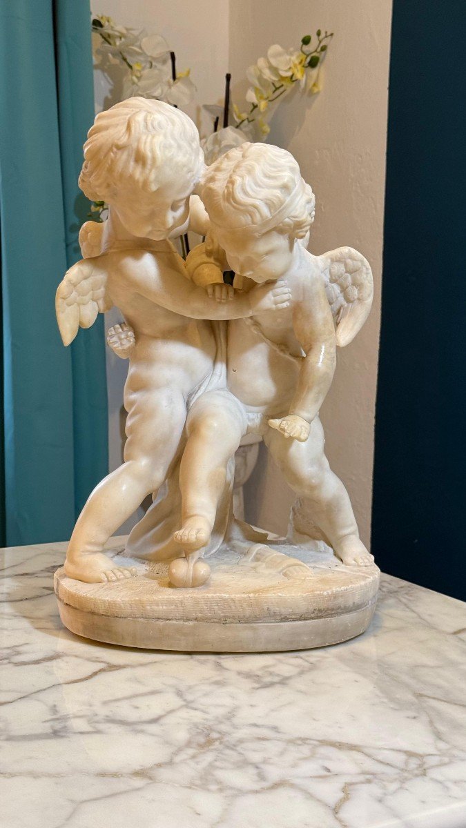 Sculpture Depicting Two Angels Fighting For The Heart Marble-photo-3