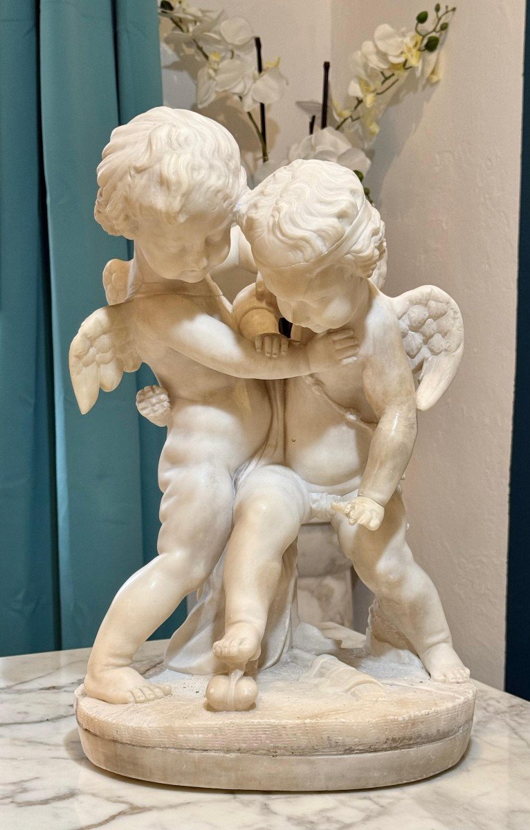 Sculpture Depicting Two Angels Fighting For The Heart Marble-photo-4