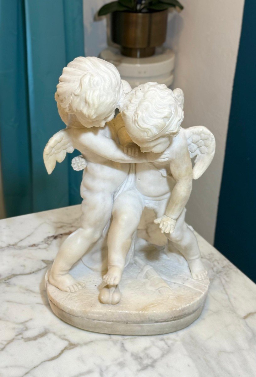 Sculpture Depicting Two Angels Fighting For The Heart Marble-photo-7