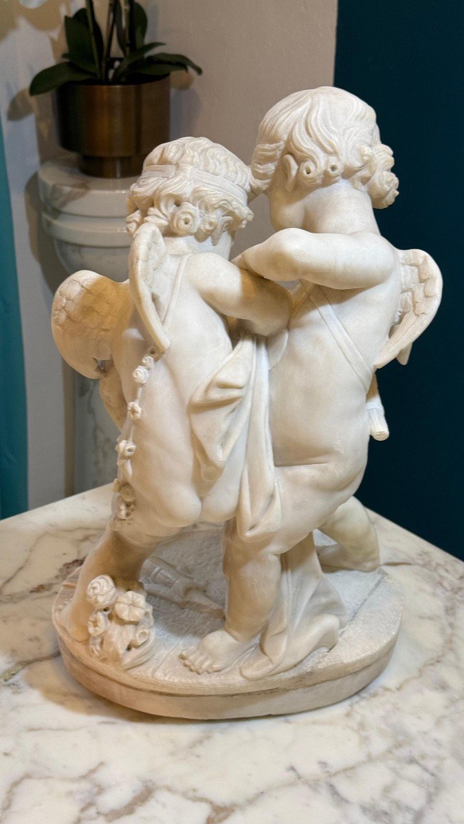 Sculpture Depicting Two Angels Fighting For The Heart Marble-photo-8