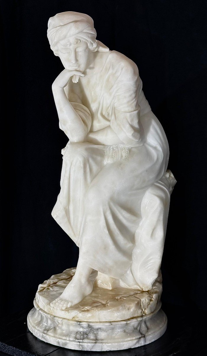 Statue Depicting A Lady Sitting Marble