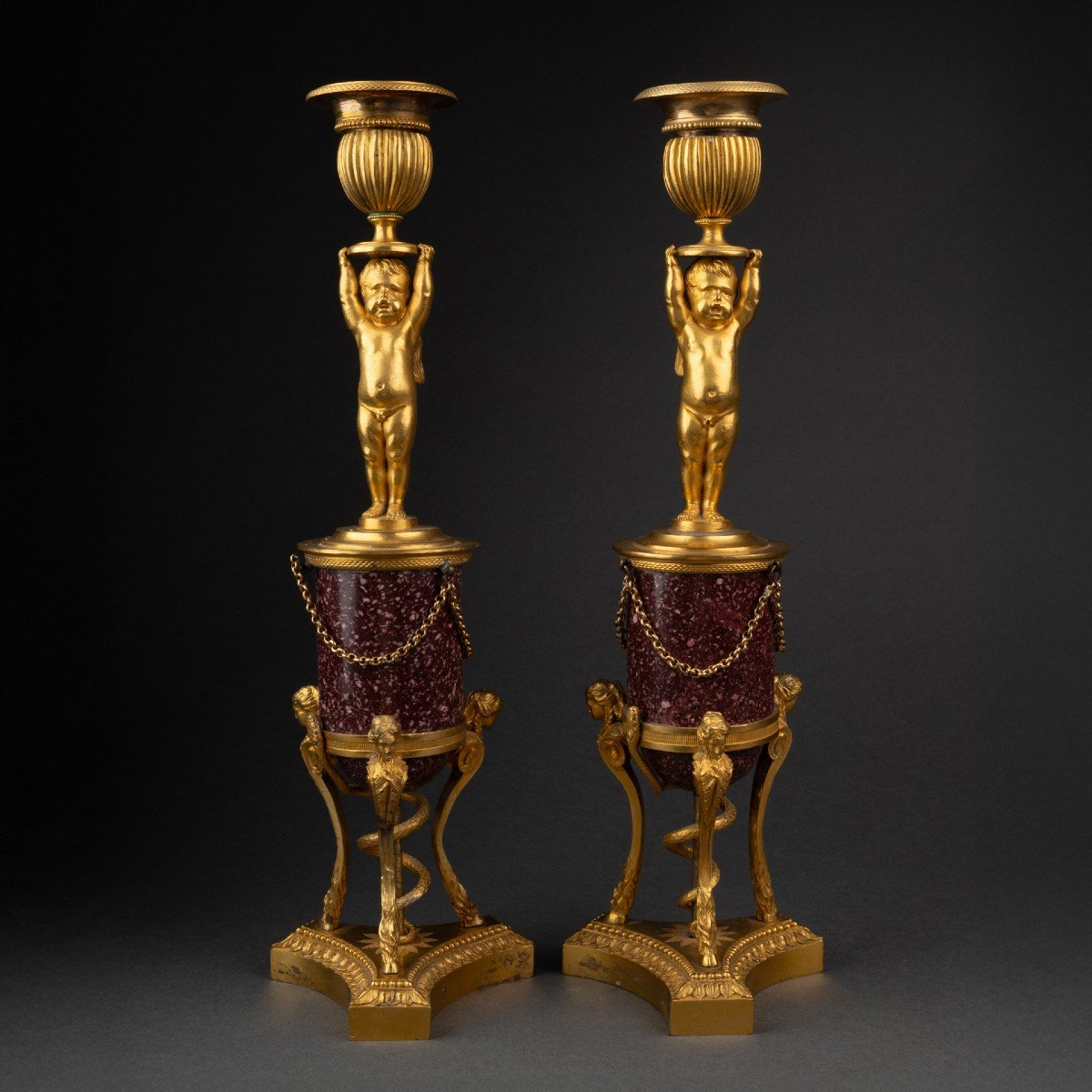 Pair Of "putti" Candlesticks On Porphyry Base, Louis XVI Period, Late 18th Century