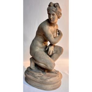 Young Naked Woman Sitting. Terracotta Sculpture