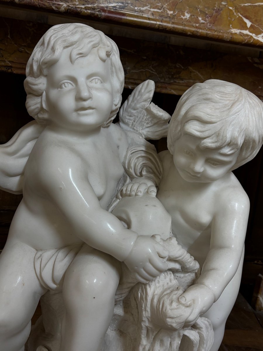 Beautiful White Marble Group Depicting Two Babies Sitting With A Fish -photo-2