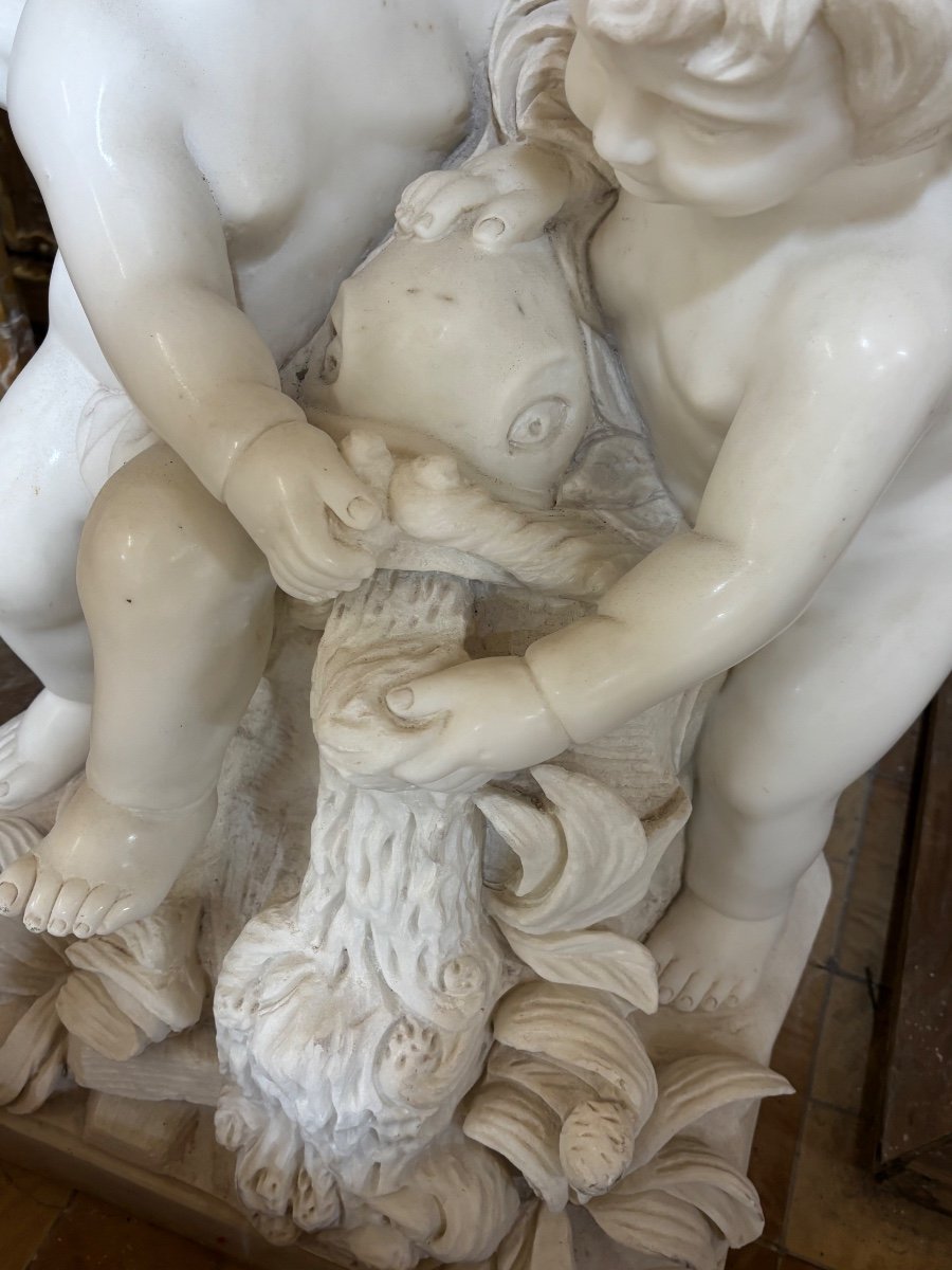 Beautiful White Marble Group Depicting Two Babies Sitting With A Fish -photo-3