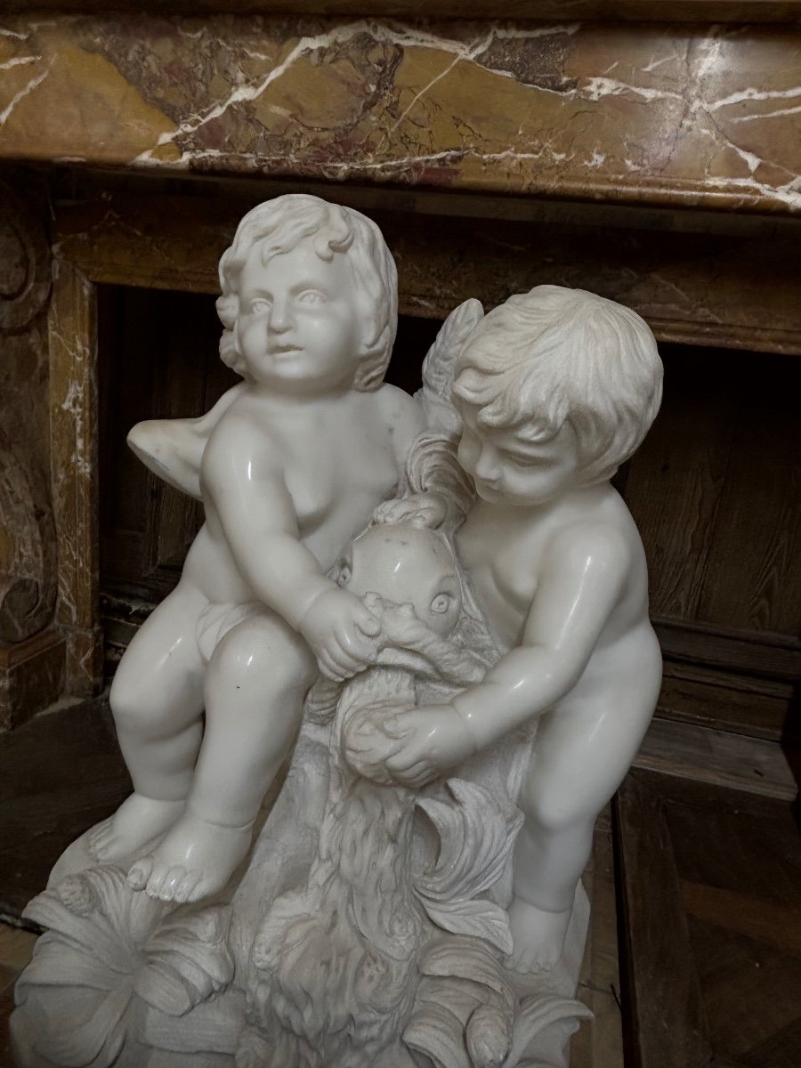 Beautiful White Marble Group Depicting Two Babies Sitting With A Fish -photo-2