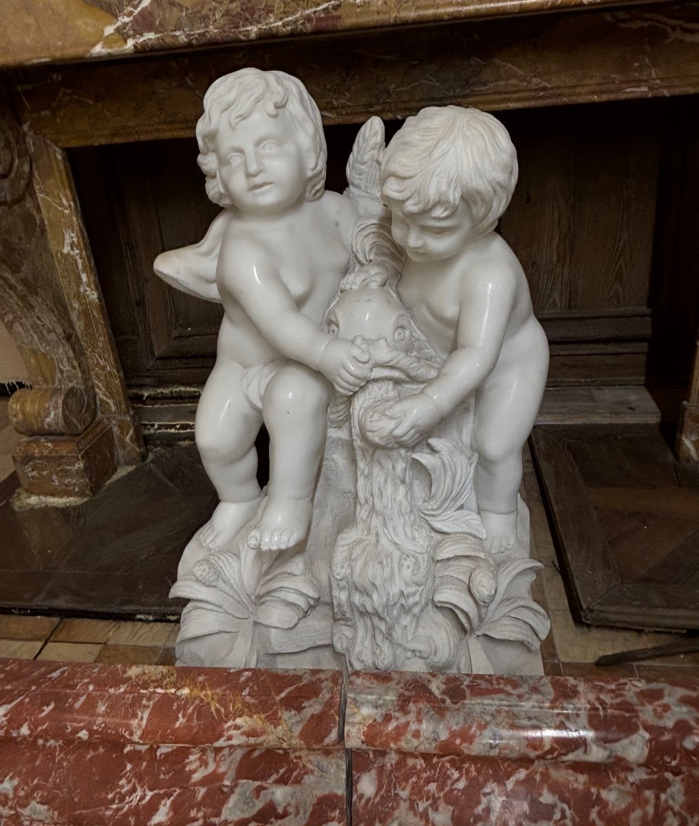 Beautiful White Marble Group Depicting Two Babies Sitting With A Fish 