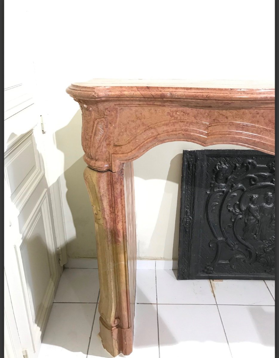 Old Regency Fireplace Made In The 18th Century In Burgundy Stone-photo-1