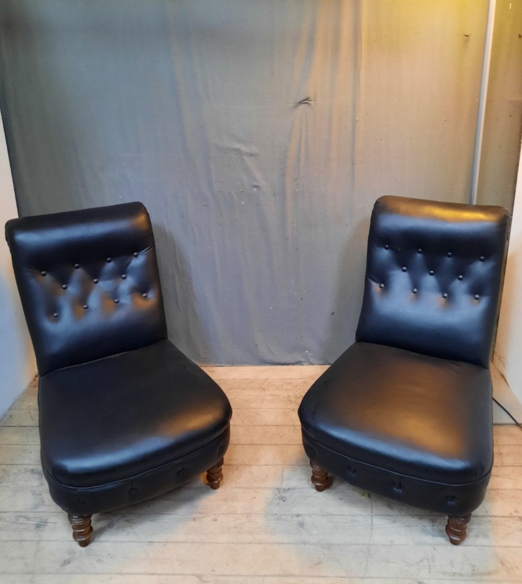 Pair Of Black Padded Armchairs-photo-1