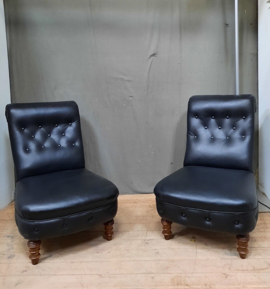 Pair Of Black Padded Armchairs