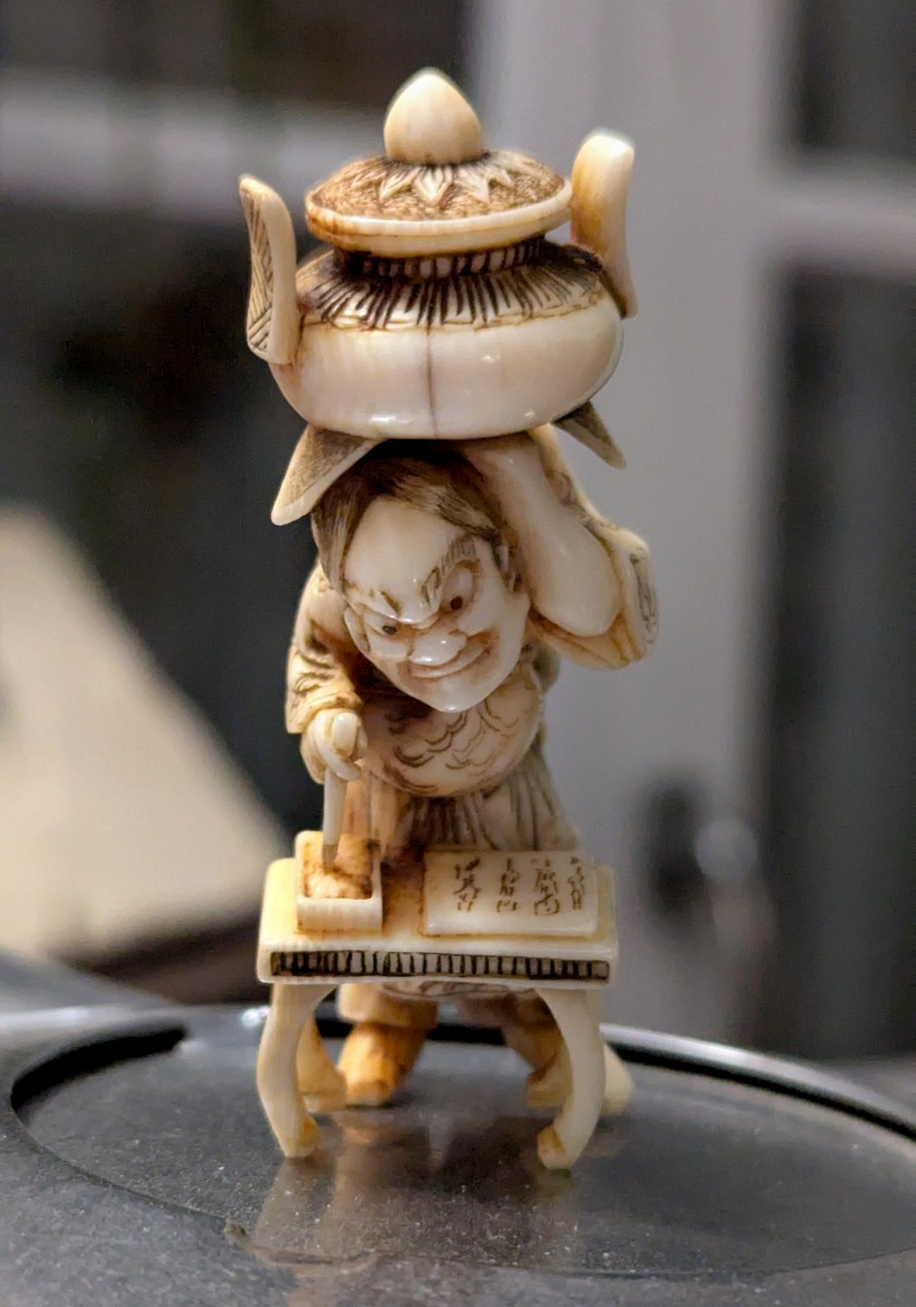 Netsuke d'une grande finesse, signé-Japon