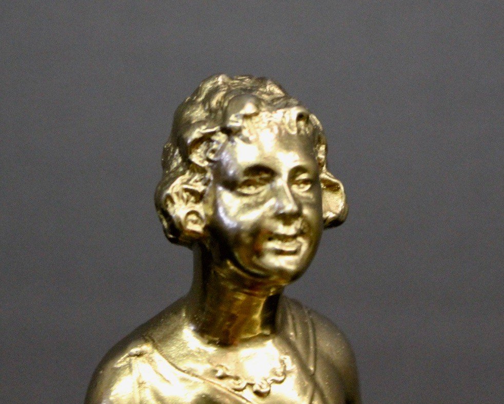 Art Deco Sculpture In Golden Regulates Representing A Woman Around 1930-photo-2