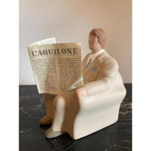 L’aquilone « Homme en costume lisant le journal »