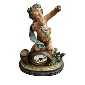 Small Clock In Polychrome Spelter Angel With Articulated Arm Striking The Hours