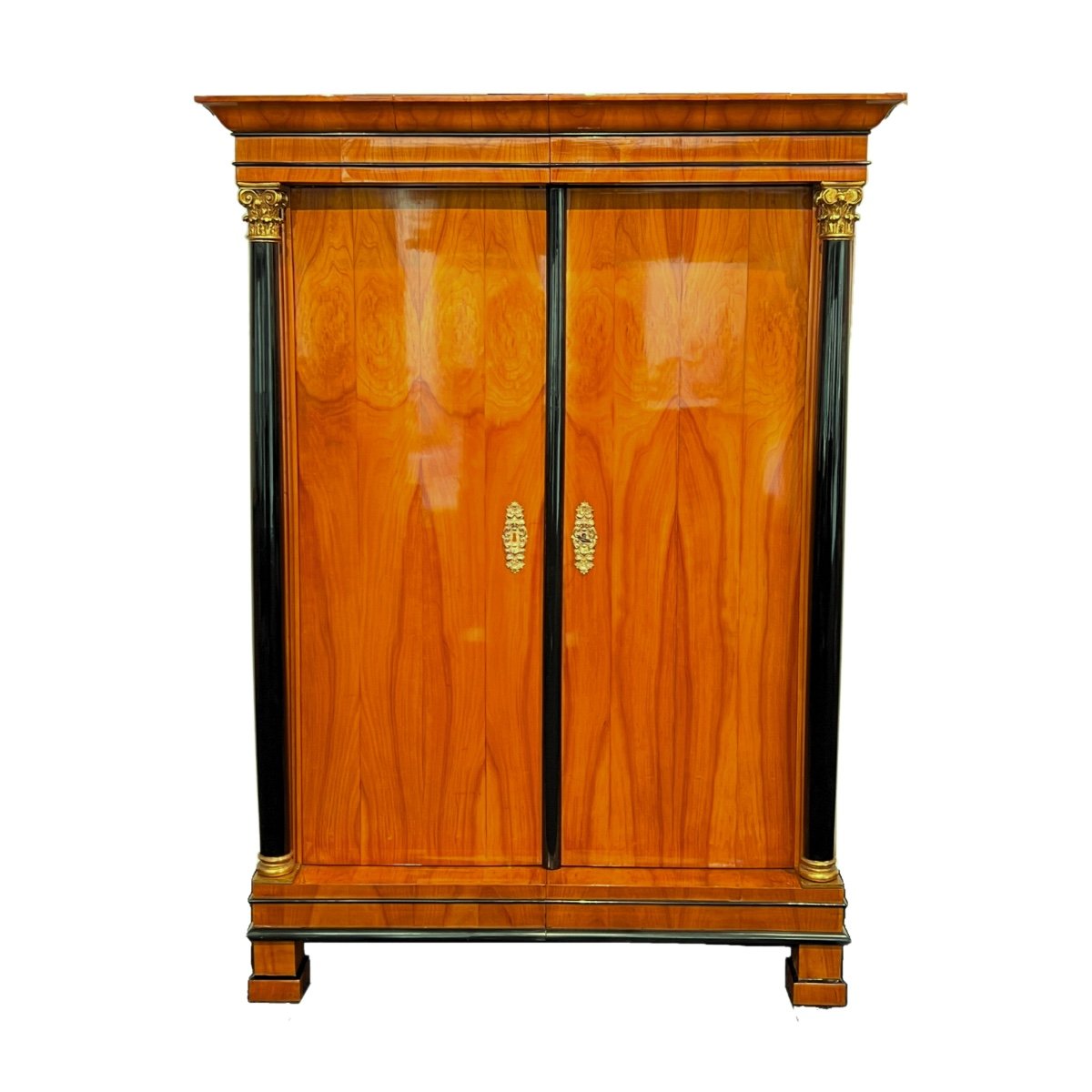 Biedermeier Wardrobe, Cherry Veneer, Columns, Golden Capitals, Austria Circa 1820