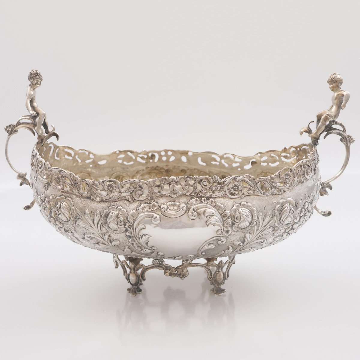 An Embossed And Chiseled Silver 900 Centerpiece, 20th Century