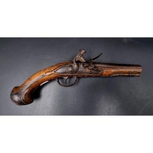 Carved Walnut Flintlock Pistol, Paris Marked Plate, Gilded Barrel 