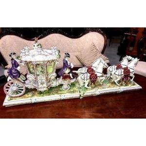 A  Carriage Group In Porcelain