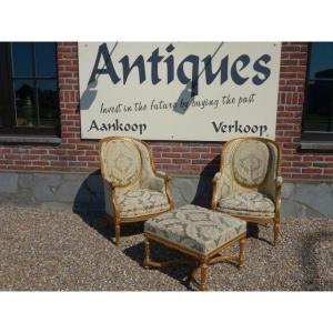 Pair Of Bergères And Its Matching Stool