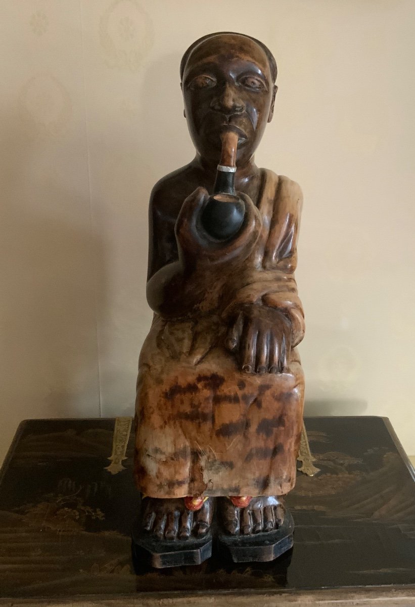 Wooden Statue Of An African Chief Smoking A Pipe-photo-2