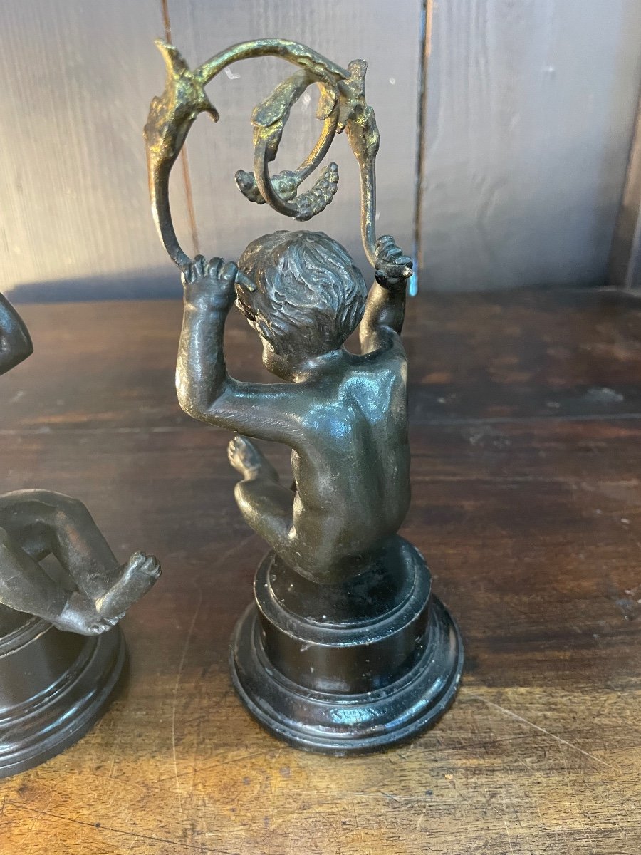 Pair Of Bronze Candlesticks With Putti Decor -photo-1