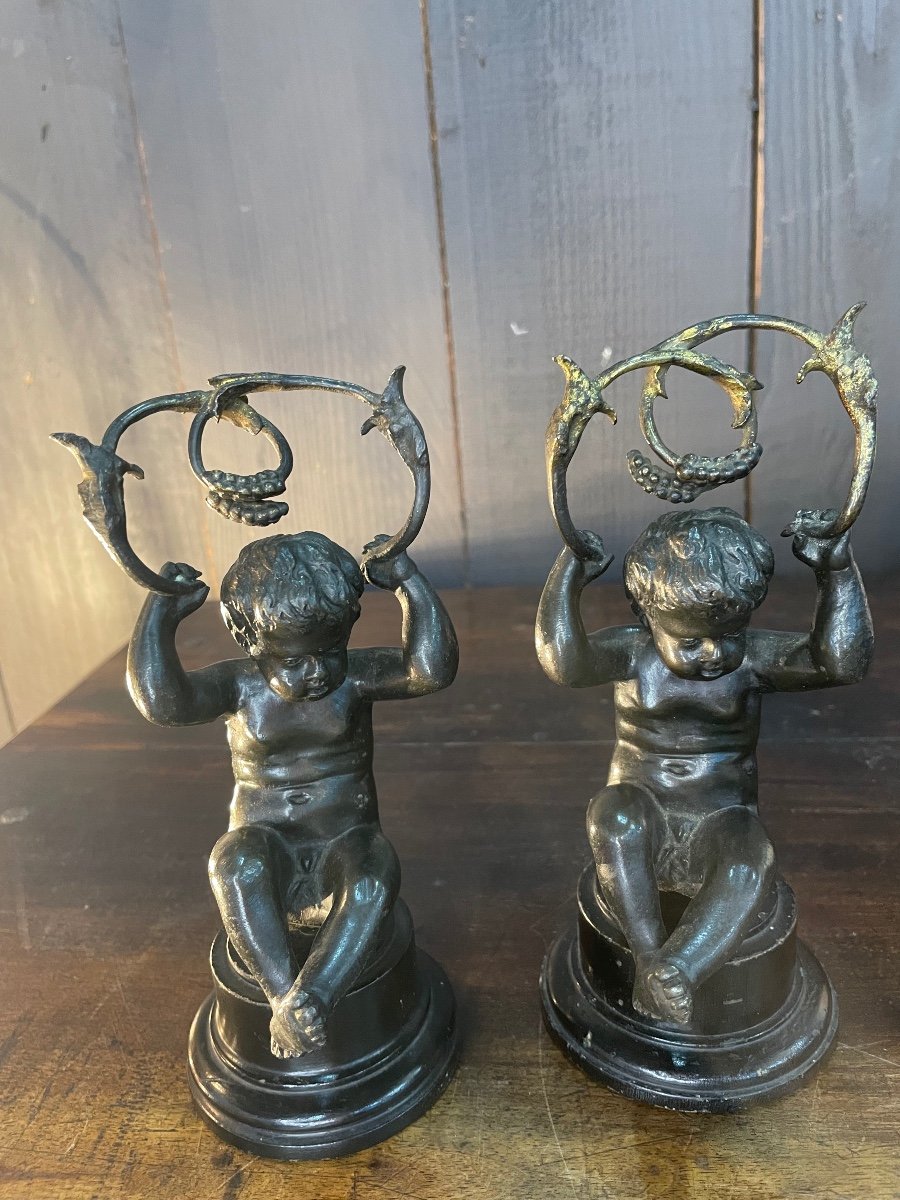 Pair Of Bronze Candlesticks With Putti Decor 