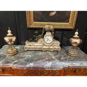 Marble And Bronze Fireplace Trim Decorated With A Putti