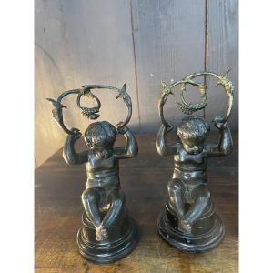 Pair Of Bronze Candlesticks With Putti Decor 