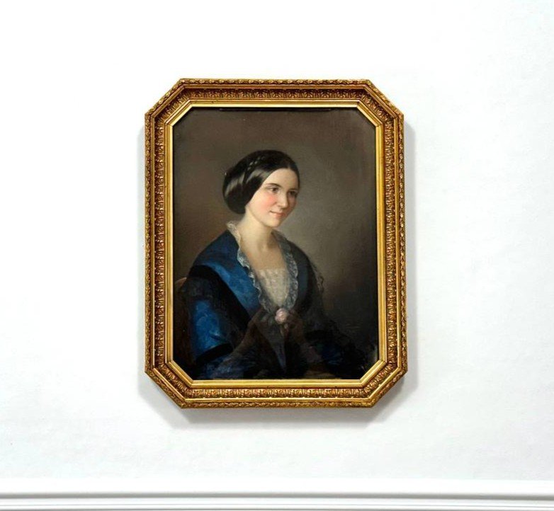 Portrait Of A Young Woman In Blue