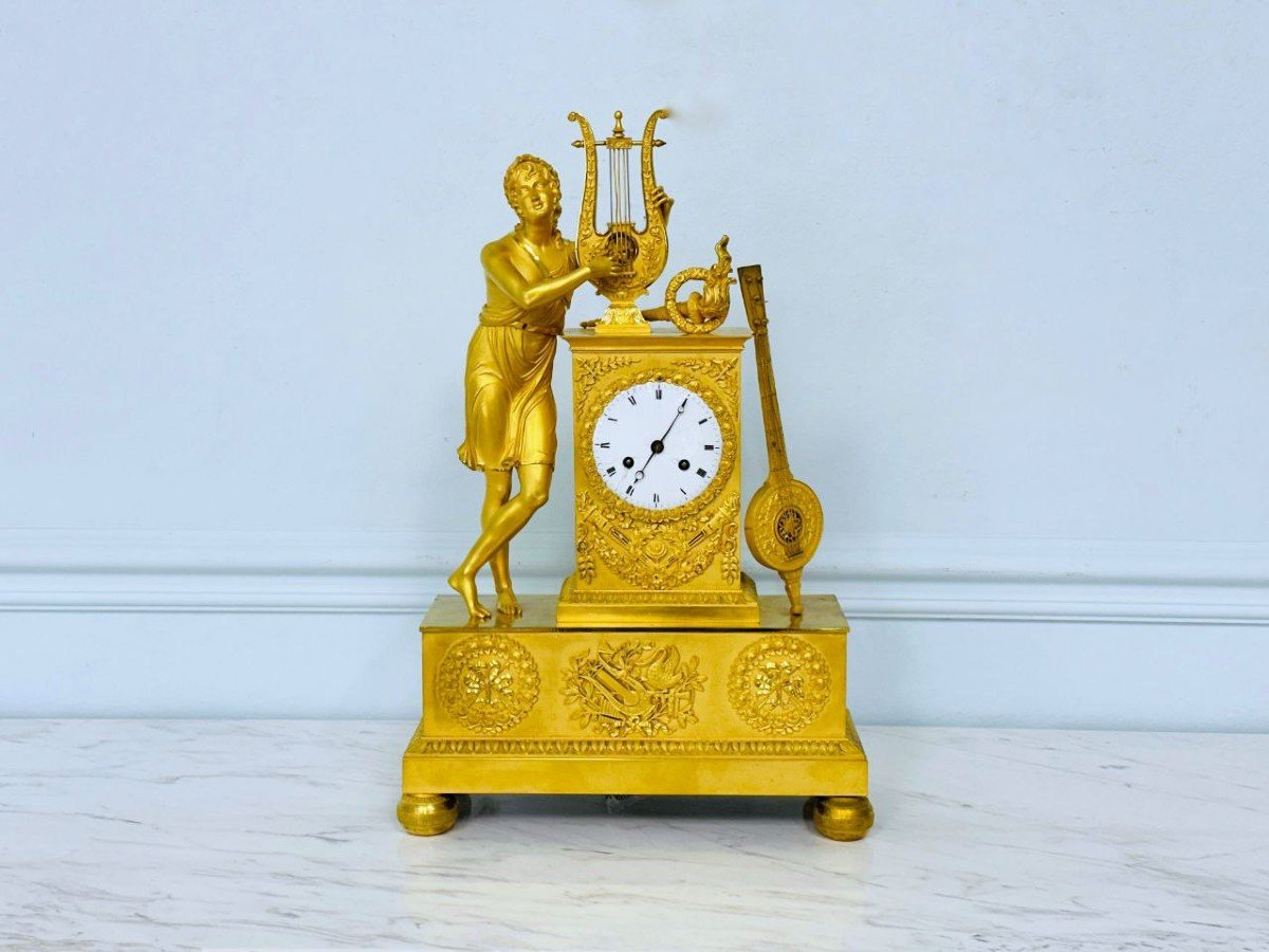 Empire Pendulum In Gilt Bronze.