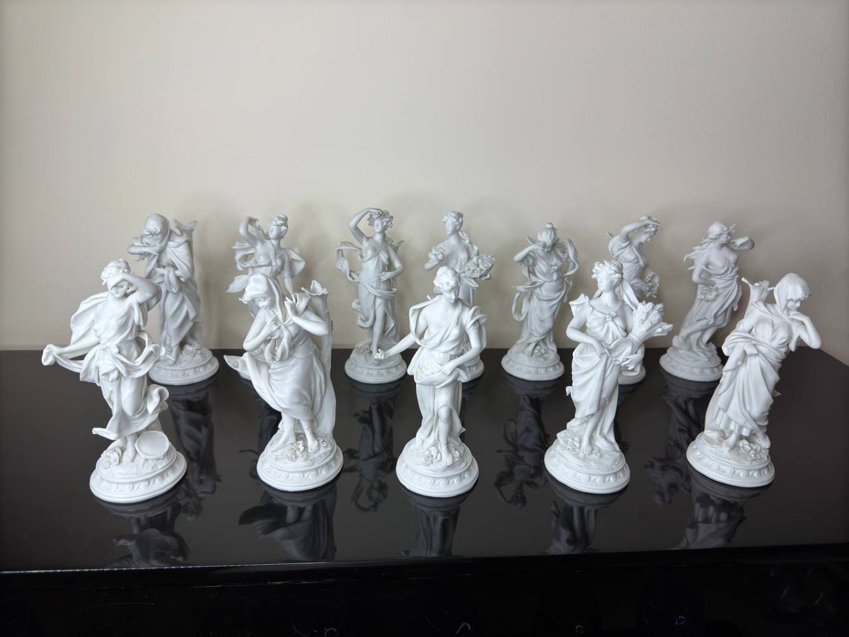 Series Of 12 White Biscuit Statuettes, Representing 12 Months Of The Year