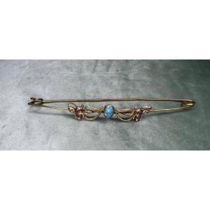 Bijou ancien , épingle Art Nouveau monté d’un turquoise et les fleurs d’iris .