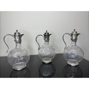 Silver And Engraved Crystal Ewers