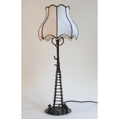 LAMPE "ECHELLE AVEC MUSICIENS" en BRONZE PATINE