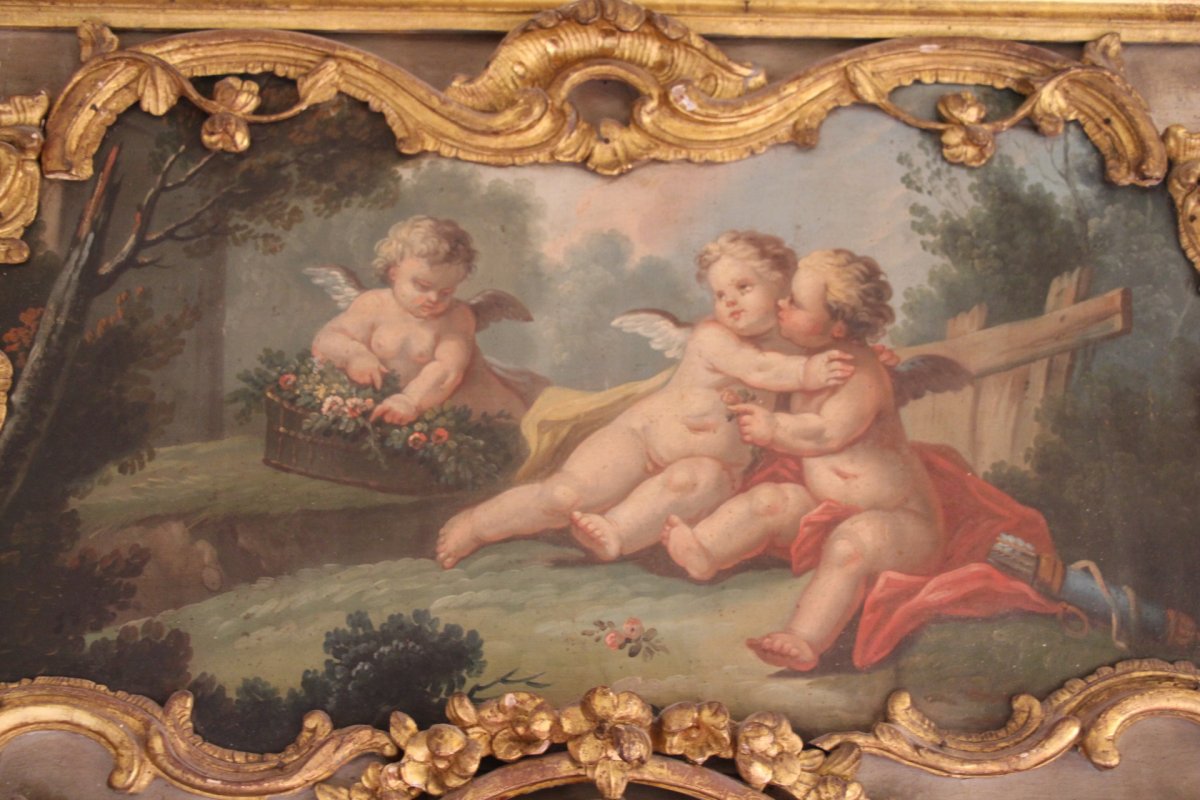 Trumeau sculpté de bois dorés, décoré d'une toile aux puttis, époque Louis XV, XVIIIe siècle.-photo-3