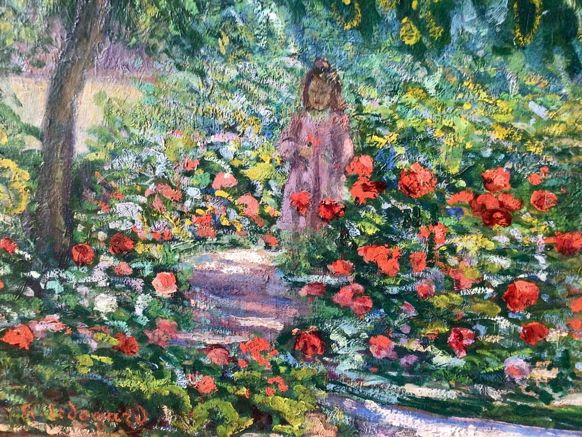 Jeune fille dans un jardin fleuri par Georges Ledogard -photo-1