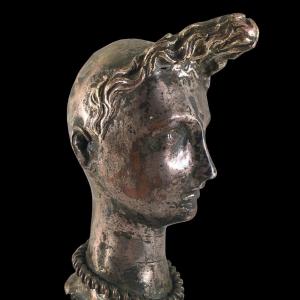 A Silver-plated Head Of Ricky With The Tuft