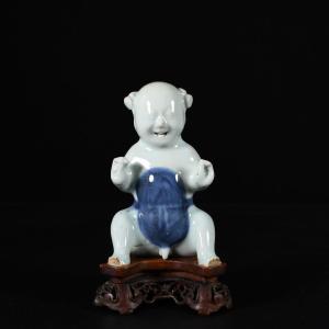 Porcelain Figure Representing A Seated Boy - China 18th Century Qianlong Period