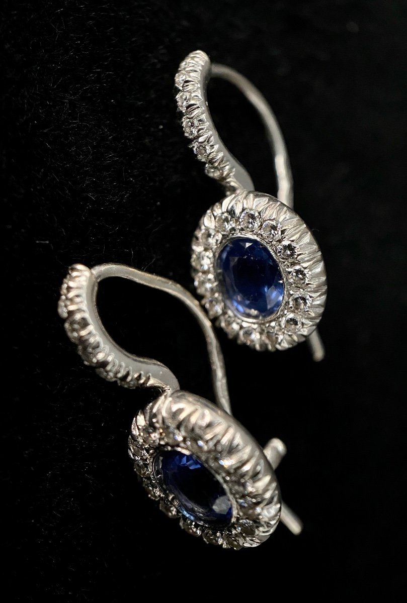 Pair Of 18k White Gold Earrings Set With 2 Oval Sapphires Total: 1 Carat