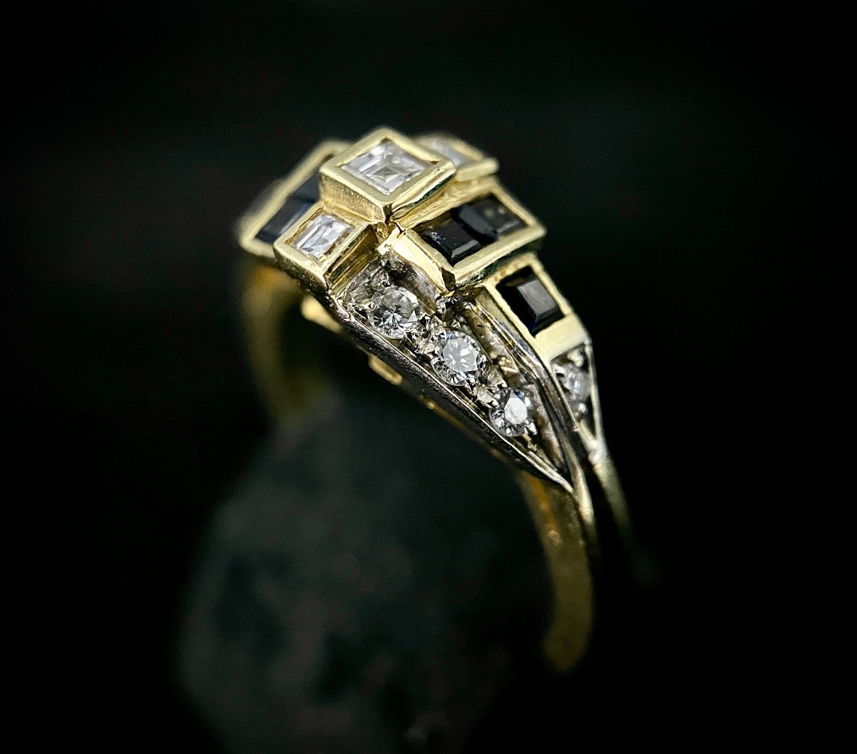 18k Two-tone Gold Ring Set With 0.60 Carat Diamonds And 6 Sapphires