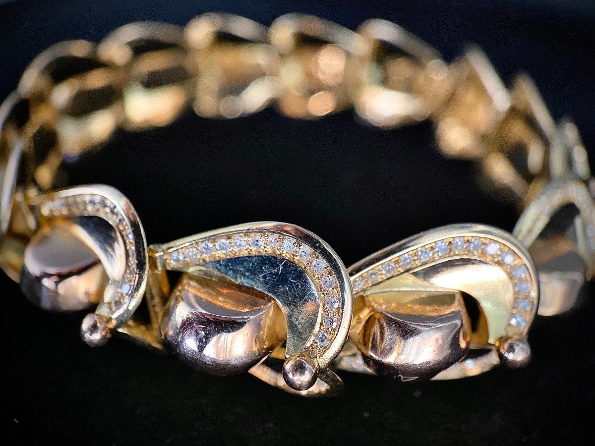 18k Yellow Gold Tank Bracelet Adorned With 14 Volutes And 420 Diamonds (4.20 Carats)-photo-2