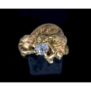 19th Century Solitaire Ring, In 18k Gold, Chimera Head Holding A 0.25 Carat Diamond