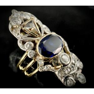 19th Century Silver On Gold Ring With Floral Decor Set With A 2.50 Ct Sapphire And 24 Diamond Roses