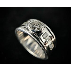 18k White Gold Ring Set With A 0.50 Carat Diamond And 10 Baguettes