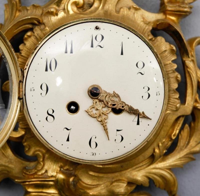 Clock Louis XV Style. Bronze-photo-1