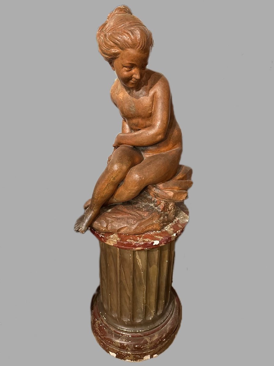 Young Girl Sitting On A Rock Holding A Bow In Terracotta 18th Century 