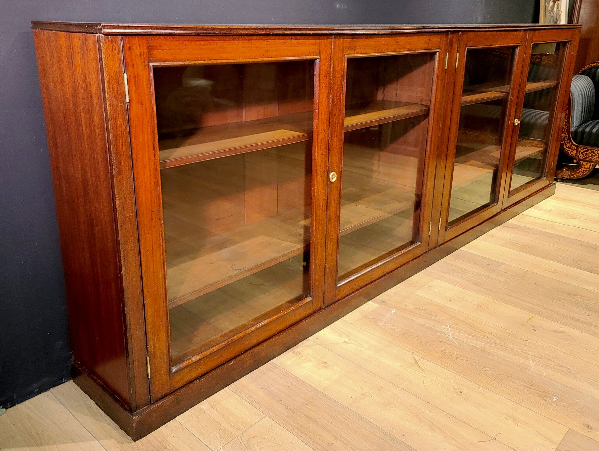 Low Mahogany Bookcase From The 19th Century. (316cm X 110cm)