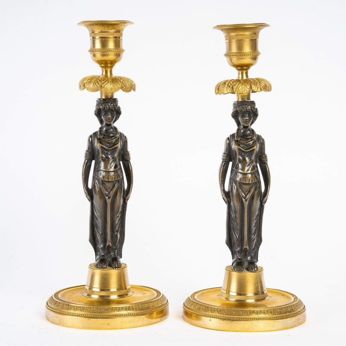 Pair Of Empire Style Gilded And Chiseled Bronze Candlesticks